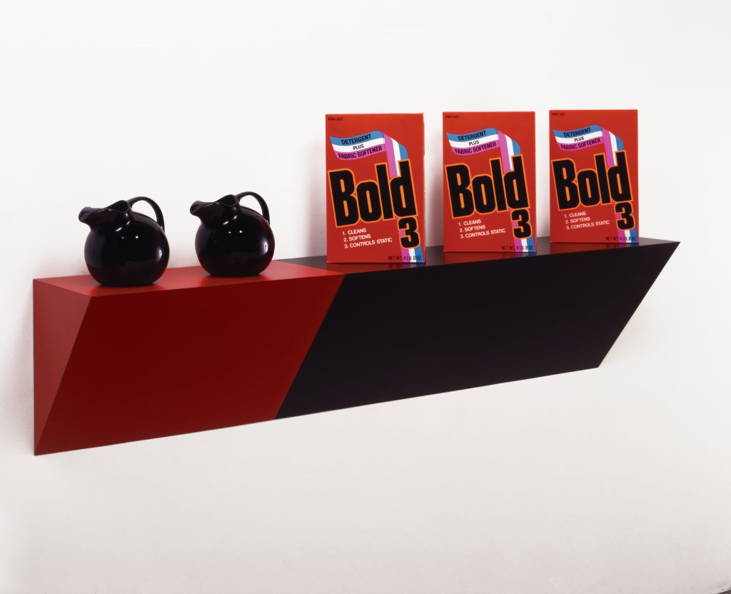 Haim Steinbach, Supremely black, 1985; plastic laminated wood shelf, 2 ceramic pitchers, 3 cardboard detergent boxes; 29 x 66 x 13 in. Private Collection; courtesy the artist and Tanya Bonakdar, New York.