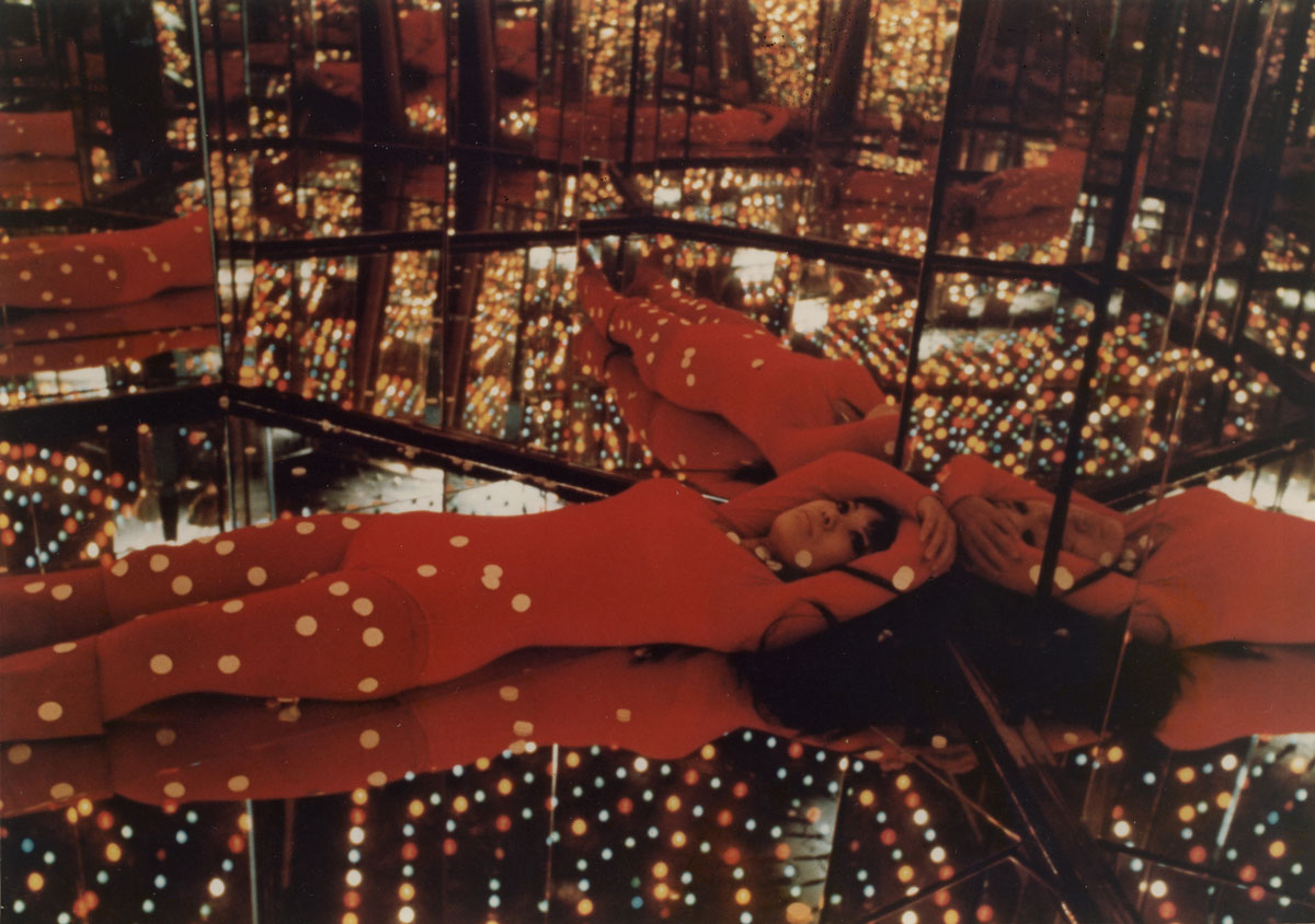 Kusama’s Peep Show or Endless Love Show, 1966. Hexagonal mirrored room and electric lights. Installed at Castellane Gallery, New York, 1966. No longer extant