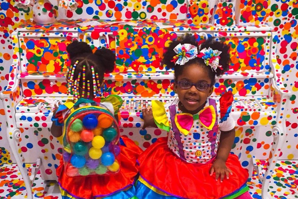 Aries and Aubrie in Yayoi Kusama’s “The Obliteration Room” at the Hirshhorn Museum and Sculpture Garden, 2017. Photo by Penelope Fly.