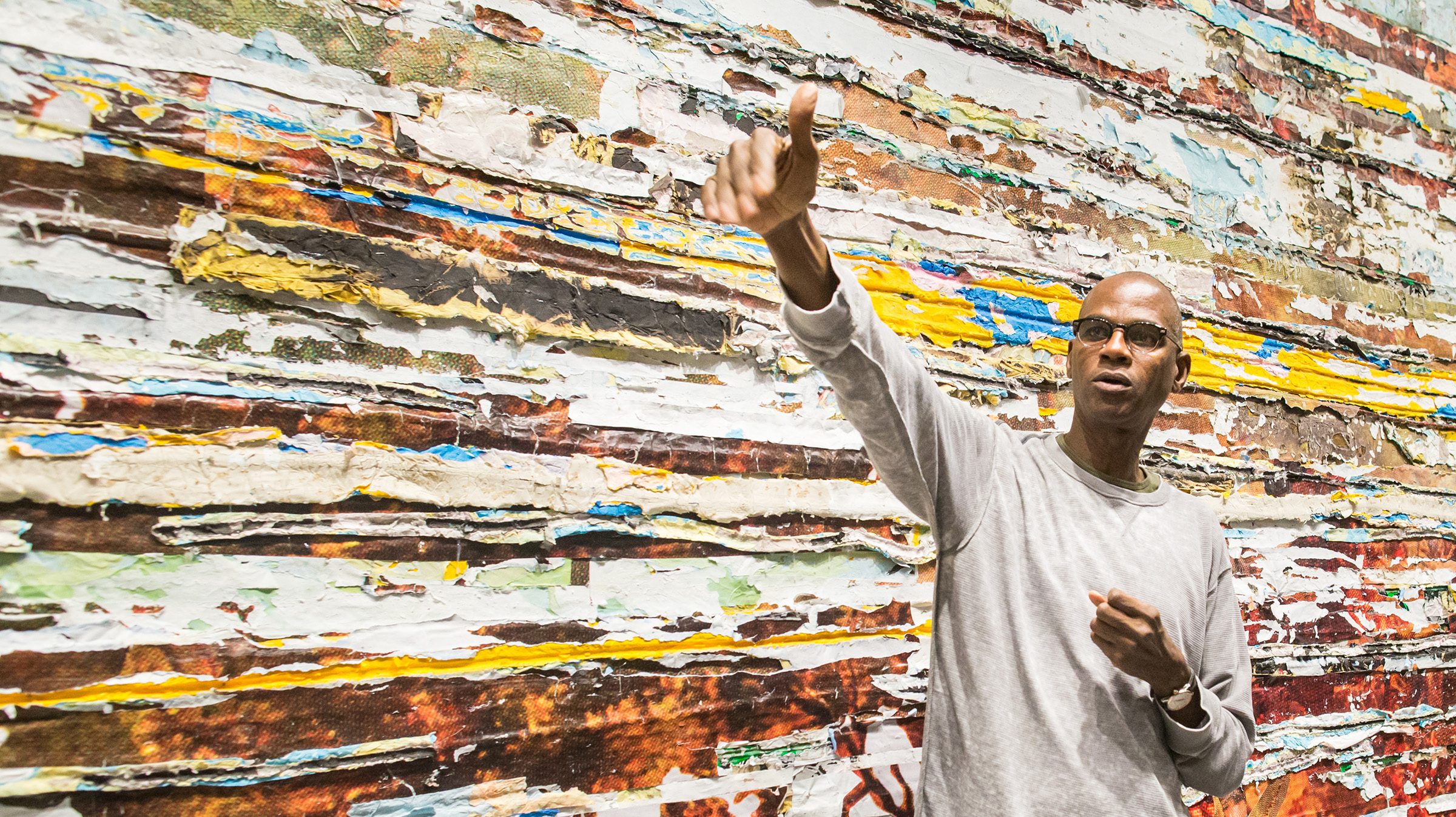 Mark Bradford at the Hirshhorn Museum and Sculpture Garden with details of Pickett’s Charge, 2017. Courtesy of the artist and Hauser & Wirth. Photo: Erin Schaff.