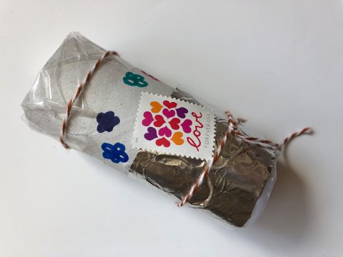 Noise maker crafted out of toilet paper roll. 