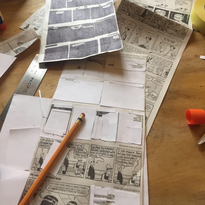 Craft in progress. Newspaper comics with blocks blacked out and paper glued on top.