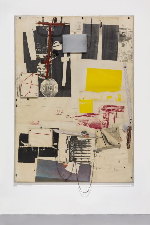 An arrangement of prints and found objects on canvas. The prints are black and white, red, and yellow. A chain connected to a moveable rectangular piece dangles off the bottom.